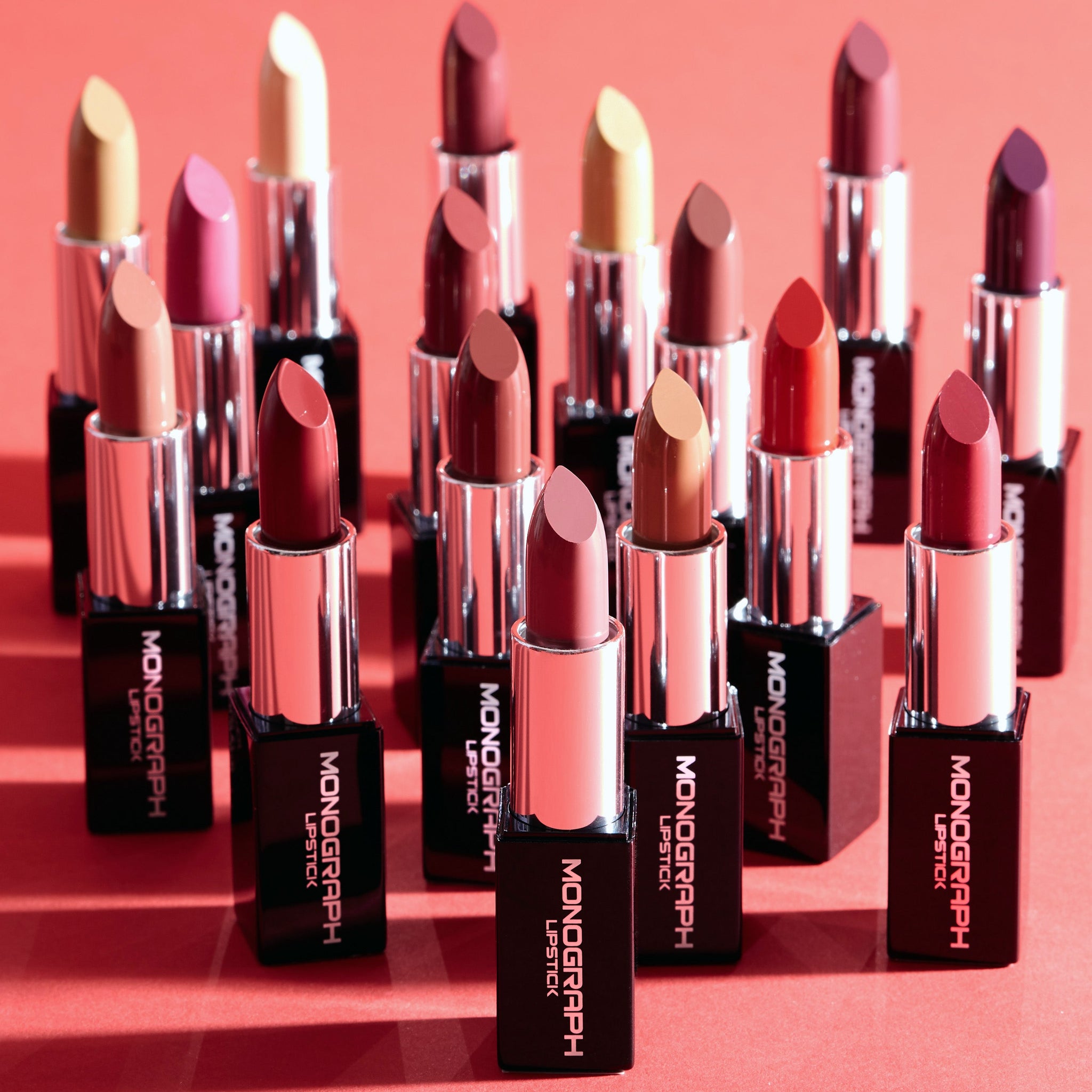 monograph cream lipsticks in grouping with bullets exposed