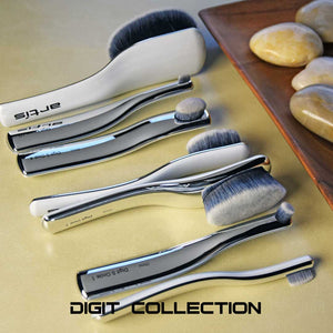 several digit collection brushes lined up on a wood surface with a natural enviroment. clicking on this image will take you to the Digit Collection product listings page.