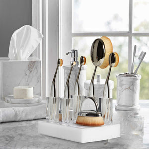 artis elite collection 6 brush holder and displayer with brushes on a vanity counter top