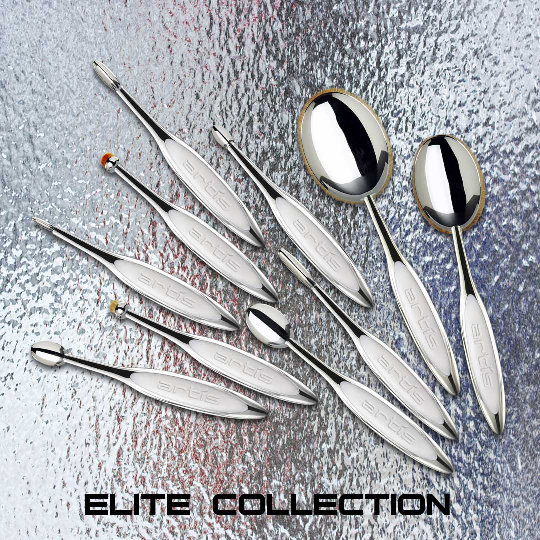 several Elite Collection brushes arranged in a spray design on a reflective rippled surface. clicking on this image will take you to the Elite Collection product listings page.